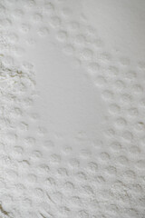 Close up of Abstract Background of Light Textured Powder
