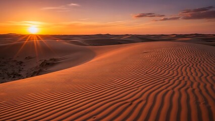 Golden hour over rolling sand dunes with dramatic light and shadow patterns