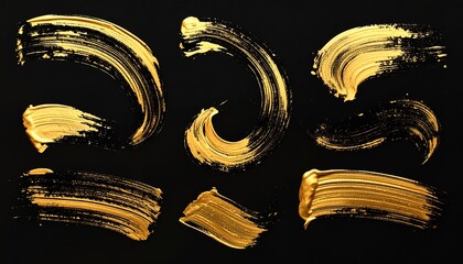 Set of golden brush strokes on a black background.