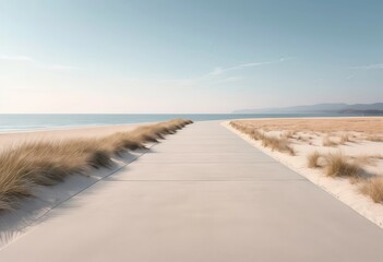 Concrete pathway promenade along sandy beach and calm blue sea