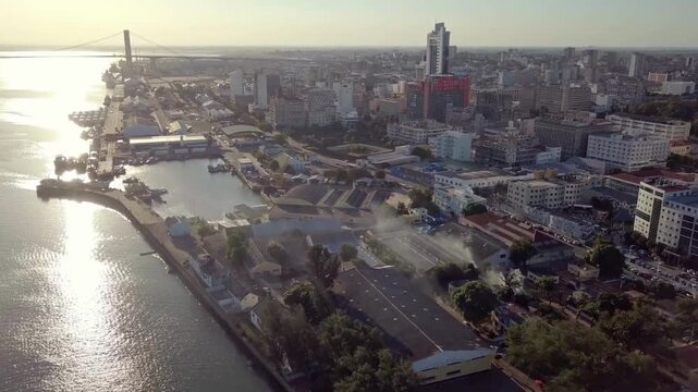 Maputo city center aerial drone shot. Business district skyscrapers and financial hub in Mozambique, Africa 4K.