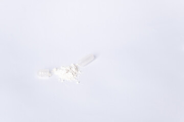 Open capsules with probiotics on a white background. Medical Topics.There is space for text.