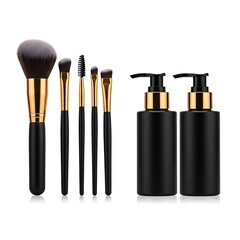 Obraz premium Cosmetic makeup brushes and lotion dispensers on white background