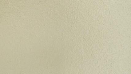 Close-up Background Texture of Light Beige Cream Painted Stucco Wall