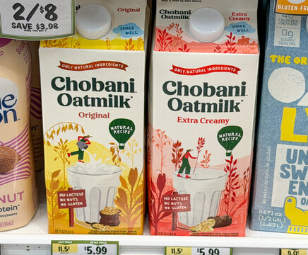 Creamy Chobani Oat Milk Cartons on Grocery Store Shelf