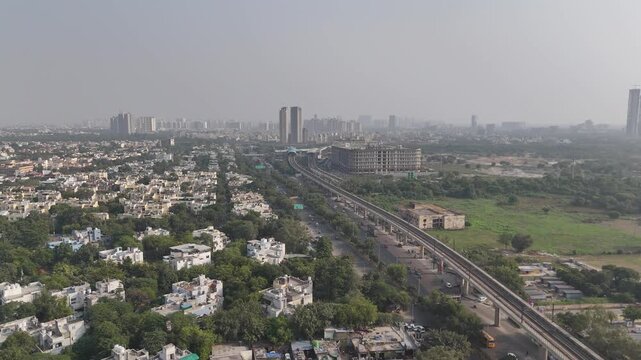 Noida&rsquo;s sweeping skyline and elevated expressways create a powerful aerial view showcasing the region&rsquo;s fast-paced urban growth and real estate expansion.