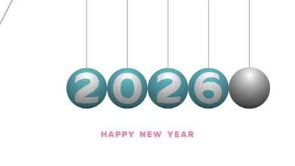 Close-up of the spheres of a working Newton's cradle with the number of the new year 2026 and a congratulatory wish at the bottom