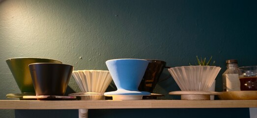 The cups of coffee and dif cup  in coffee shop 