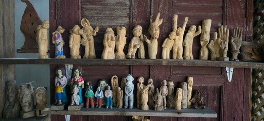 Wooden figurines on display in studio DIY 