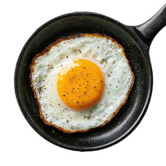 Fried eggs cooking in a black frying pan on a kitchen stove