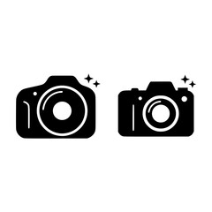 Two camera vector silhouettes with sparkling highlights, representing photography and digital media concepts