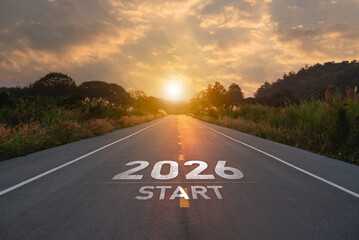 New Year 2026. Serene Road Leading into Sunset with Clear Sky and Greenery, Marked with 2026 Start for Future Journey and New Beginnings in Scenic Landscape