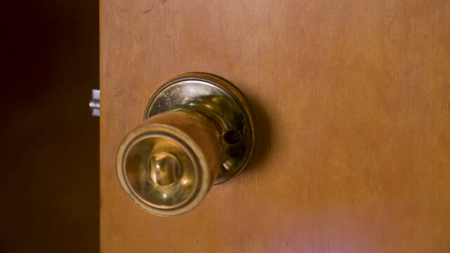 The last screw holding the two sections together.