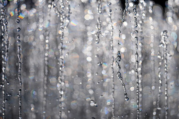 Water drop background. Clear droplet on surface. Dripping splashing effect. Splashing waters drops. Falling droplet in motion. Abstract splash drop design. Textured wet backdrop. Water drop pattern.