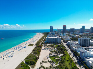 Fototapeta premium Aerial view of Miami skyline. Drone shot of Miami cityscape. Top view of South Miami and the ocean. Miami skyline with skyscrapers and coastline from top.