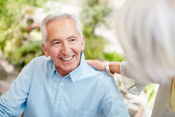 Shoulder, support and elderly couple outdoor for care, connection and bonding with trust on getaway. Senior man, woman and comfort in nature with partner for love, retirement and smile on vacation
