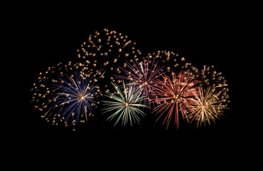 Festive colorful fireworks display isolated on black background for celebration and anniversary