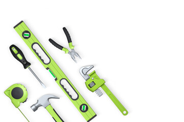 Various construction tools like hammer, pliers, screwdriver and tape measure, isolated on white background, concept of home repair
