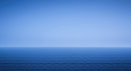 Obraz premium Conceptual image of an expansive distant boundary line in soft blue and violet tones, suggesting limitless potential and future growth ,distance ,conceptual ,depth