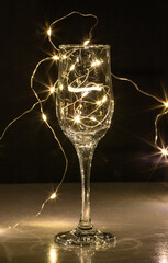 Artistic composition of warm LED lights inside a glass