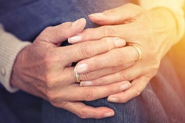 Senior woman, ring and hands for thinking, contemplation and remember memory. Jewelry, fingers and elderly person in retirement for reflection, resting and nostalgia while waiting with closeup