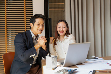 Businessmen celebrate success together