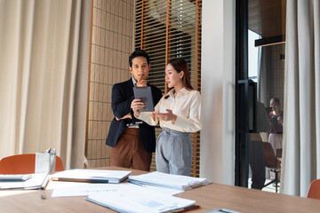 Businessmen working and thinking together