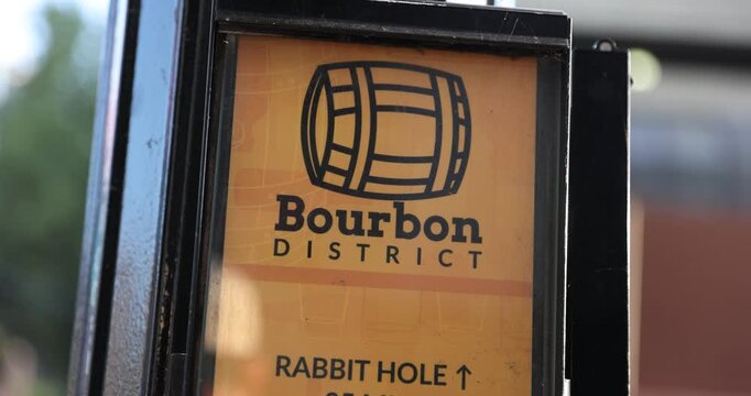 Tight shot of a sign featuring the word &ldquo;Bourbon&rdquo; in Louisville, Kentucky. Highlights the city&rsquo;s deep ties to whiskey culture and tourism.