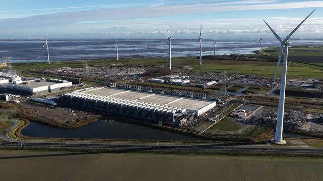 Aerial drone video of a hyperscale data center in Eemshaven, The Netherlands, highlighting internet services, big-data processing power, and large-scale digital infrastructure.