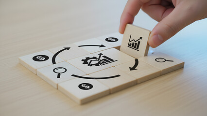 Healthcare business growth concept — hand placing chart block on wooden tiles