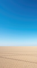 Fototapeta premium A wide, expansive empty plain under a clear blue sky, symbolizing potential and the concept of freedom, ready for new journeys and decisions ,serene ,freedom ,outdoor