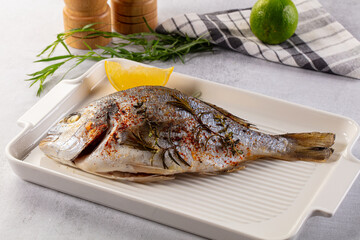 Baked dorada fish with spices