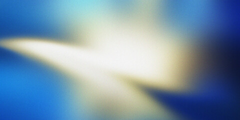 Soft blue and yellow light blur with grainy texture abstract