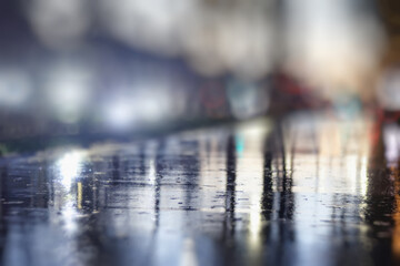 Night city blurred background, bokeh in autumn city traffic cars