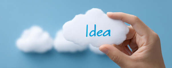Idea cloud concept creativity innovation inspiration vision strategy planning startup message float in blue sky hand holding soft white cloud symbol with optimistic mood
