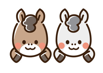 ひょっこり顔を出した2頭の馬