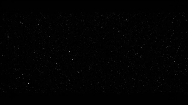 Seamless night sky background with twinkling stars and subtle dust particles for cinematic visuals and astronomy projects