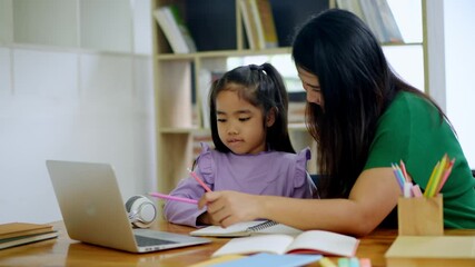 Learning together mother and daughter bonding over homework at home educational activity cozy environment engaged viewpoint