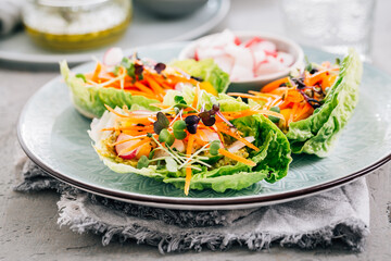 Healthy vegetable wraps with lettuce and avocado dip