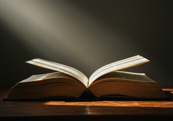 Fototapeta premium An ancient volume of sacred text resting open on a rustic surface, illuminated by gentle rays of light filtering through a window ,belief ,guidance ,covenant
