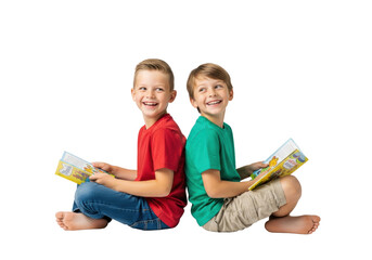 two cheerful caucasian boys (8-10), barefoot, sitting back-to-back holding storybooks and smiling brightly on a high-key white studio floor, concept of childhood friendship and learning