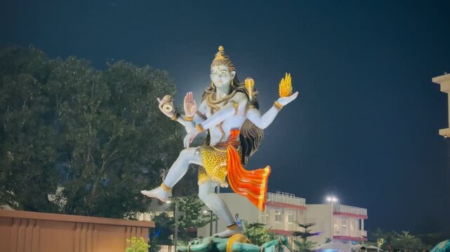 Dynamic Shiva Tandav Statue Under Night Sky