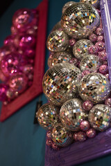 Mirror shiny ball on a pink background. Disco ball	