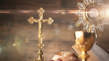 Eucharist and Sacrament: A Golden Chalice, Monstrance, Cross, Bible, Grapes, and Bread on a Rustic Wooden Background