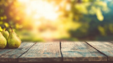 Pears on a wooden table with a soft focus background in the afternoon light