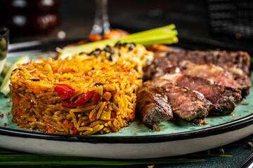 Spicy vegetable rice with juicy steak slices