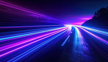 Long exposure captures vibrant streaks of light along a highway at dusk