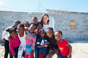 Poverty, volunteer and portrait of children outdoor for ngo organization, education drive and...