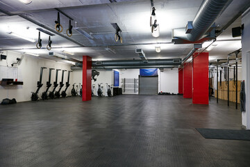 Fitness, empty or equipment in gym for exercise, interior or vacant in health center. Sports,...