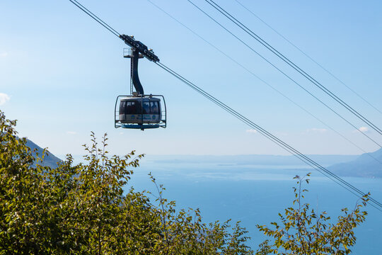 Funivia Malcesine - Monte Baldo cable car over Lake Garda in Northern Italy, offering breathtaking mountain views and a unique lakeside travel experience